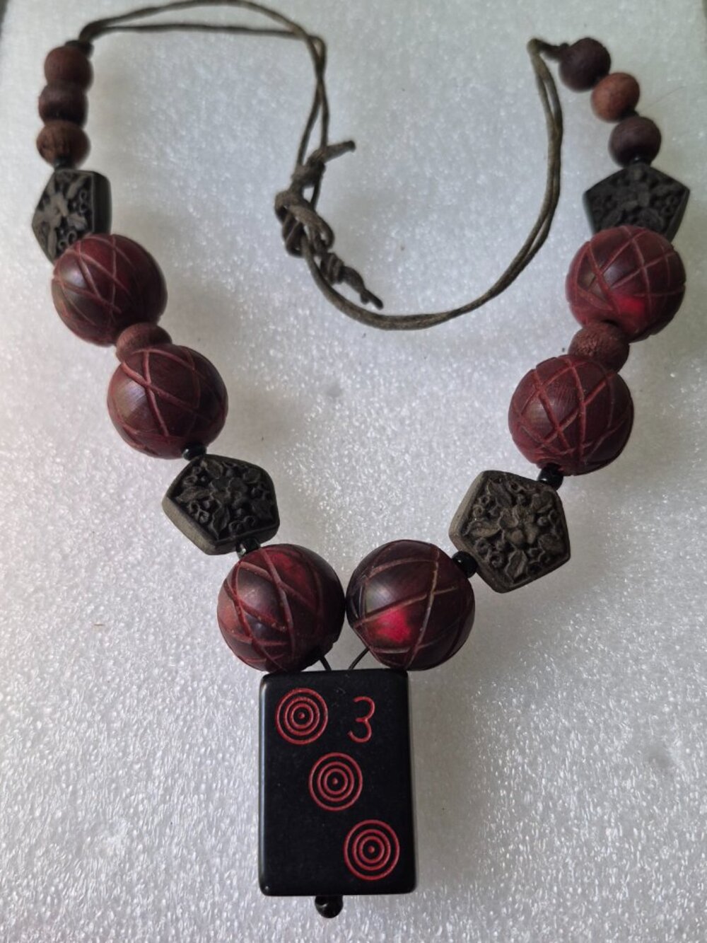 One-of-a-kind Necklace carved Brown and Red Cinnabar beads with Mahjong 3 Tile